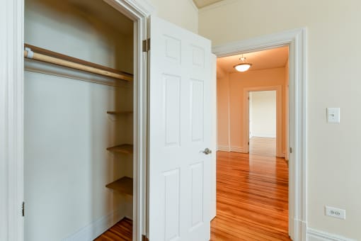 large closet with shelving and  view of hallway at  2701 Connecticut apartments in washington dc