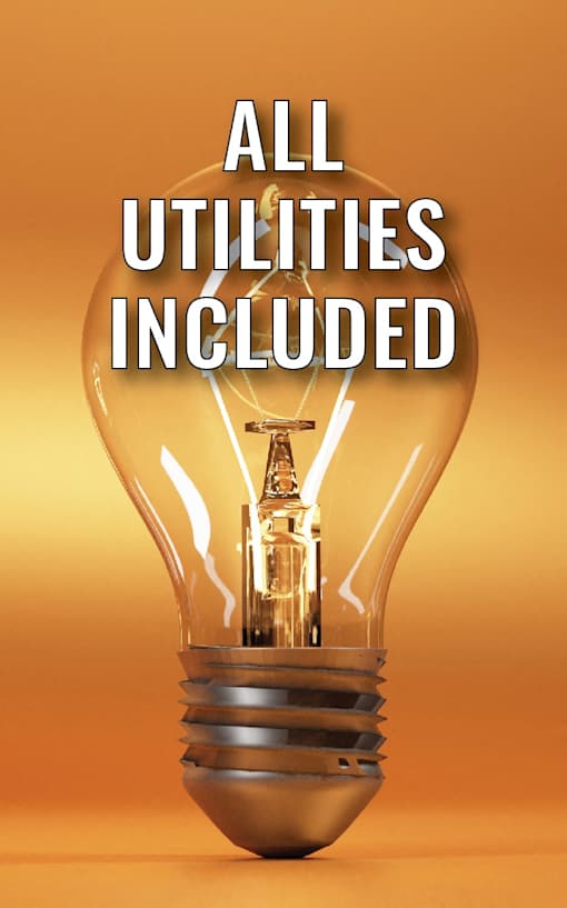 A light bulb with the text "ALL UTILITIES INCLUDED" on it.