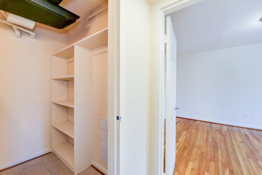 large bedroom closet with shelving  at cambridge square apartments in bethesda md