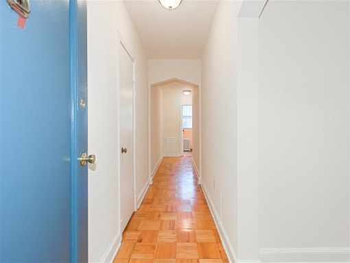 apartments unit hallway with hardwood floors at 1400 van buren apartments in washington dc