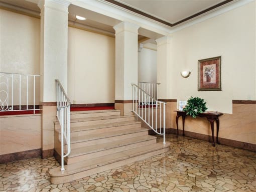 lobby lounge with stairs to apartment homes at 2801 Pennsylvania apartments in washington dc