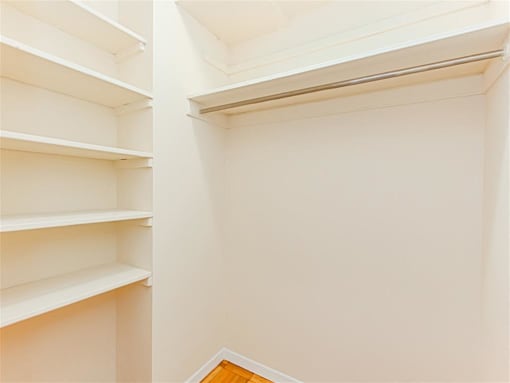 large closets with shelving and hardwood floors at brunswick house apartments in dupont circle washington dc