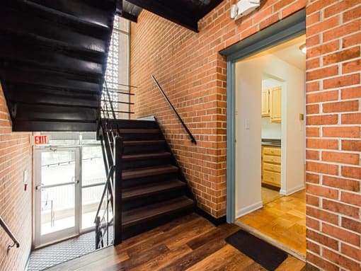 stairwell and exposed brick walls at chillum place apartments in lamond riggs washington dc