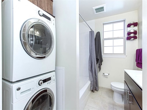 laundry area and view of bathroom at fairway park apartments in washington dc