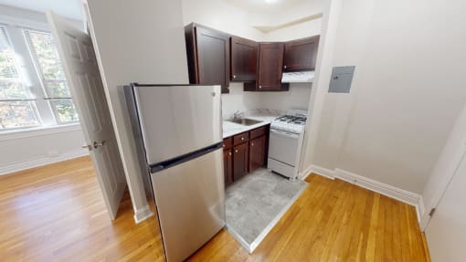 Studio A kitchen and entry way at Hampton courts apartments in washington dc