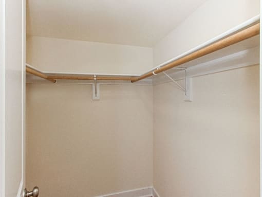 large walk in closet with shelving at t street apartments in washington dc