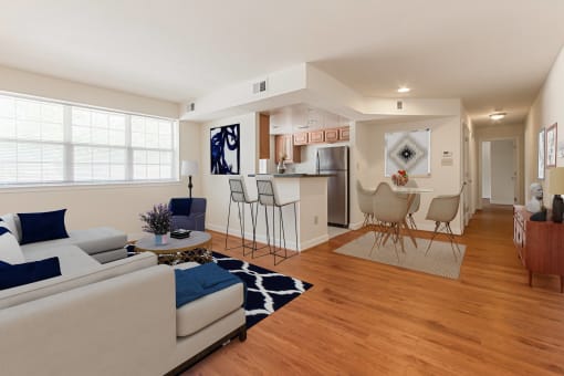 open layout of apartment showing living area, dining area, kitchen and breakfast bar at t street apartments in washington dc
