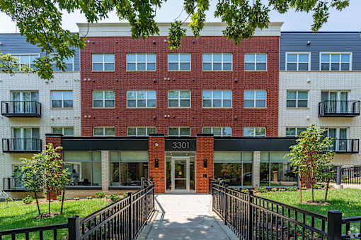 A red brick building with the number 3301 on it.