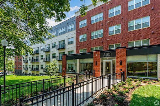 A red brick building with the number 3301 on it.