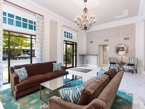 lobby lounge with couches and a coffee table at the calverton apartment building in adams morgan washington dc