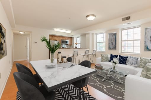 open layout showing living area, dining area and kitchen at the oaks apartments in washington dc