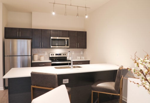 Kitchen from Dining View at The Met at Metro Centre Apartments, Owings Mills