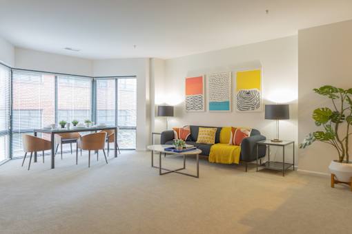 Living Room and Dining Area in an apartment with a city view