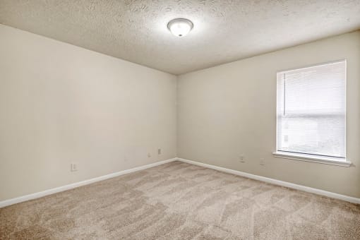 Carpeted Bedroom at Bradford Gwinnett Apartments, Norcross, GA