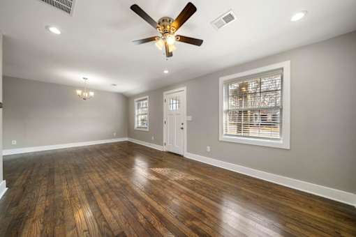 Living room with ceiling fan at Balfour Marietta Apartments, Marietta, GA, 30060