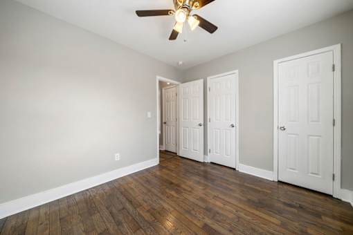 A bedroom with a bed, a ceiling fan at Balfour Marietta Apartments, Marietta, GA, 30060