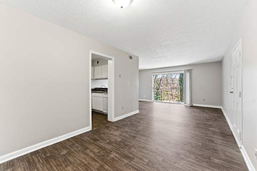 Empty room with shiny wooden floor at The Reserve at Brookhaven, Atlanta, GA