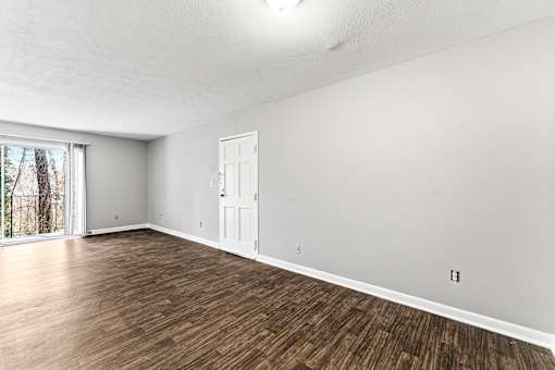 Room with shiny wooden floor at The Reserve at Brookhaven, Atlanta, Georgia