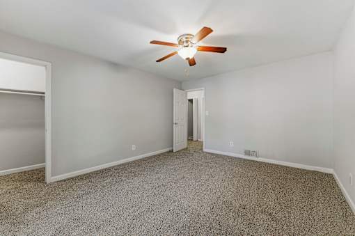 Room with large window and ceiling fan at Broadway at East Atlanta, Atlanta