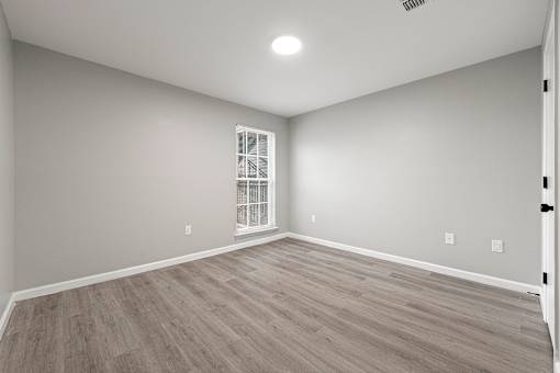 Room with wooden floor at 2000 Oasis Apartments, Atlanta, 30316