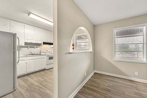 A kitchen with white appliances at Balfour 296, Lilburn, GA 30047