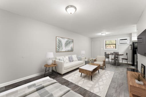 a living room with a white couch and a wooden coffee table  at Balfour 296, Lilburn, 30047