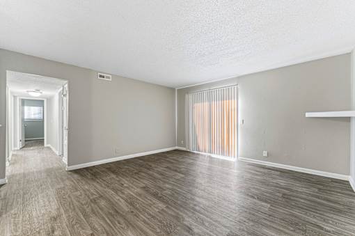 Room with shiny floor at Lacota Apartments, Atlanta, Georgia