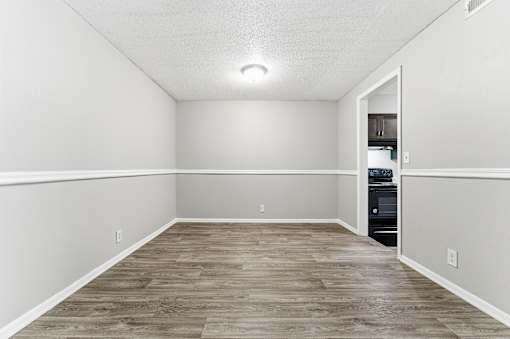 Room with wooden floor at Lacota Apartments, Atlanta