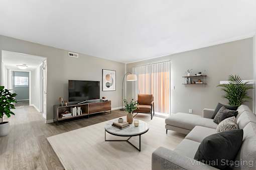 Living room with tv at Lacota Apartments, Atlanta, GA