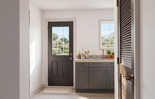 A kitchen with a black door and a window.