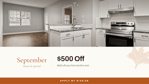 A kitchen interior with a promotion for September move-in special offering $500 off the first month's rent.