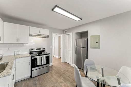 Kitchen and dining space at Balfour East Lake Apartments, Atlanta, NY, 30316