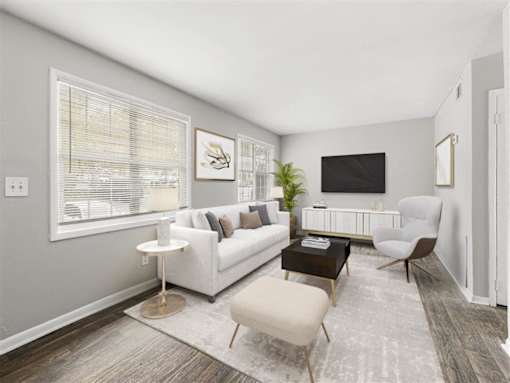 Living room with modern TV at Pinewood Townhomes, Tucker, 30084