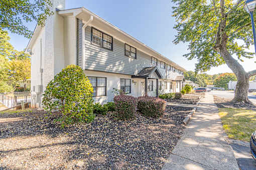 Gravel area in front of the house at Pinewood Townhomes, Tucker