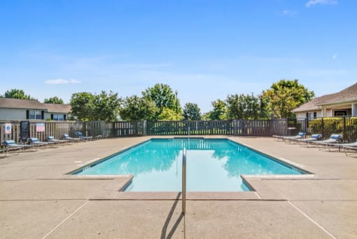 Sparkling community swimming pool available to residents at Parklight Townhomes