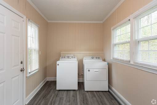 A laundry room with a washer and dryer.