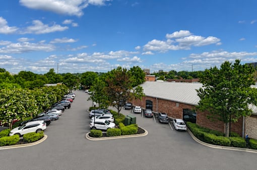 A parking lot with cars parked in it.