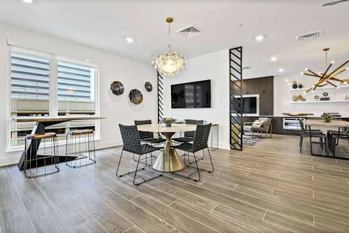 A modern dining room with a wooden table and chairs. at The Palms 1101, Columbia, SC