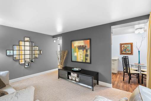 a living room with a couch and a table