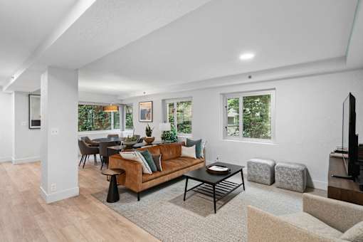 a living room with a couch and a table
