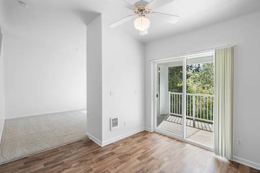 Living Room With Balcony at Summer Creek Apartments, Tigard, OR
