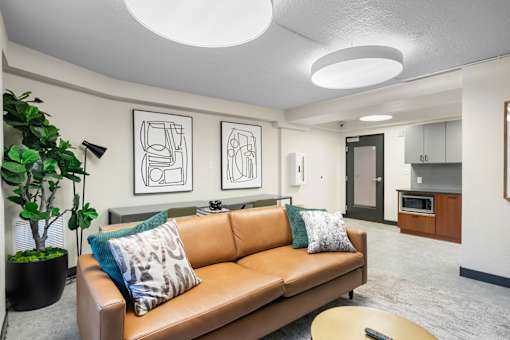 a living room with a couch and a table