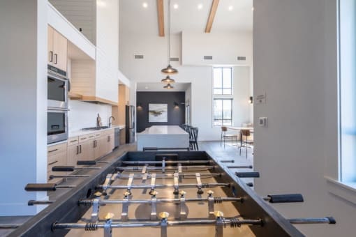 a large kitchen with a large island in the middle at Sonder Fields in Happy Valley, OR