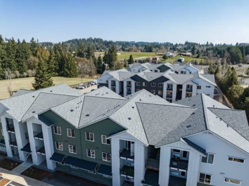 a view from above of a city with roofs and trees at Sonder Fields in Happy Valley, OR