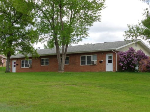 a view of the front of a brick house