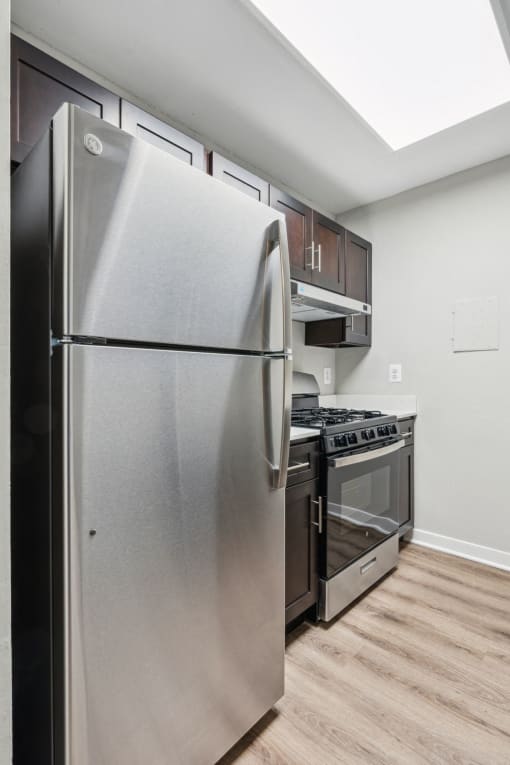 Modern, energy-efficient kitchens with stainless steel appliances at Park Montgomery apartments located along the Purple Line in Silver Spring, MD.