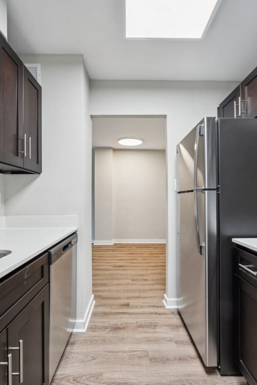 Sleek galley kitchens at Park Montgomery apartments located along the Purple Line in Silver Spring, MD.