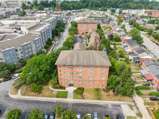 an aerial view of a building in the middle of a city