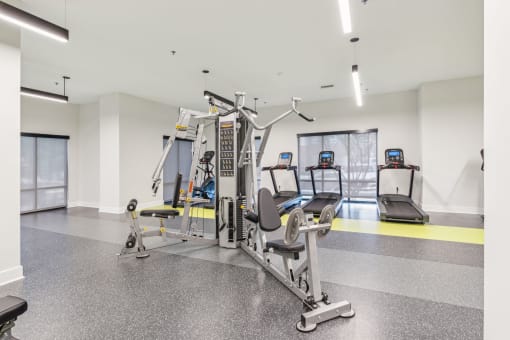 Legacy at Twin Rivers gym with weights and cardio equipment.