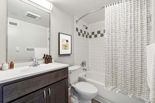 Well-appointed bathroom in a 2-bedroom apartment at Edgewood Commons 611 & Gardens, featuring clean, modern fixtures and a spacious layout designed for convenience and ease of use.